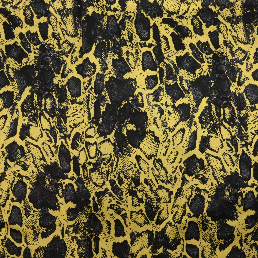 Satin de soie imprimé cobra gris fond jaune